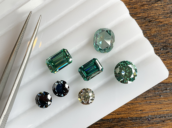 Pic of several colored moissanite in different shapes.